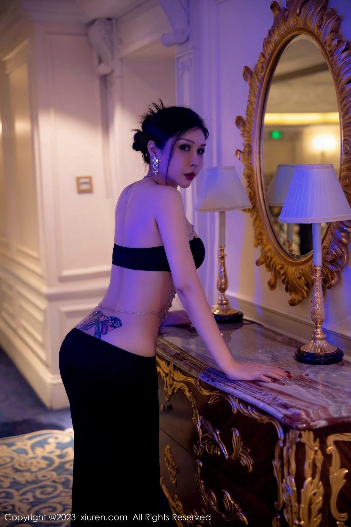 XiuRen第6304期_模特田冰冰私房性感黑色情趣長裙低胸秀惹火身材撩人誘惑寫真63P(14)