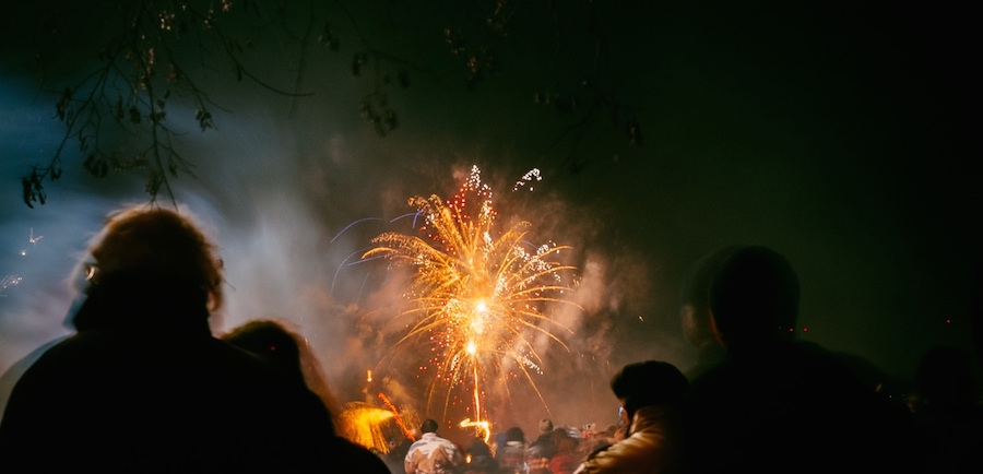 person watching fireworks
