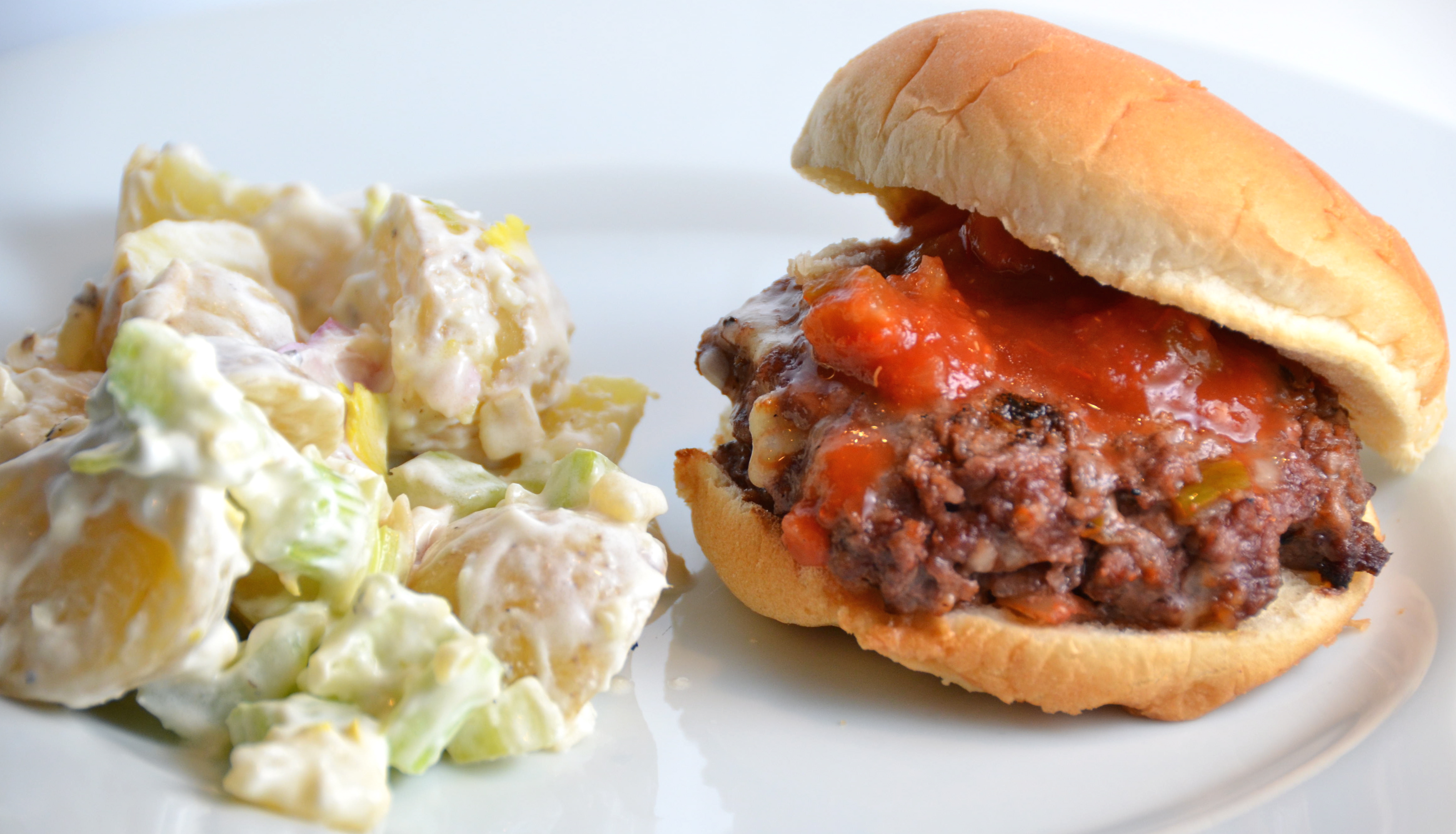 All In One Burger With Celery And Potato Salad. Hot New Music From Book