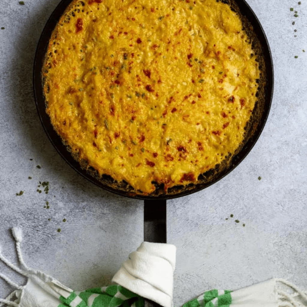 spaghetti squash gratin in a black pan