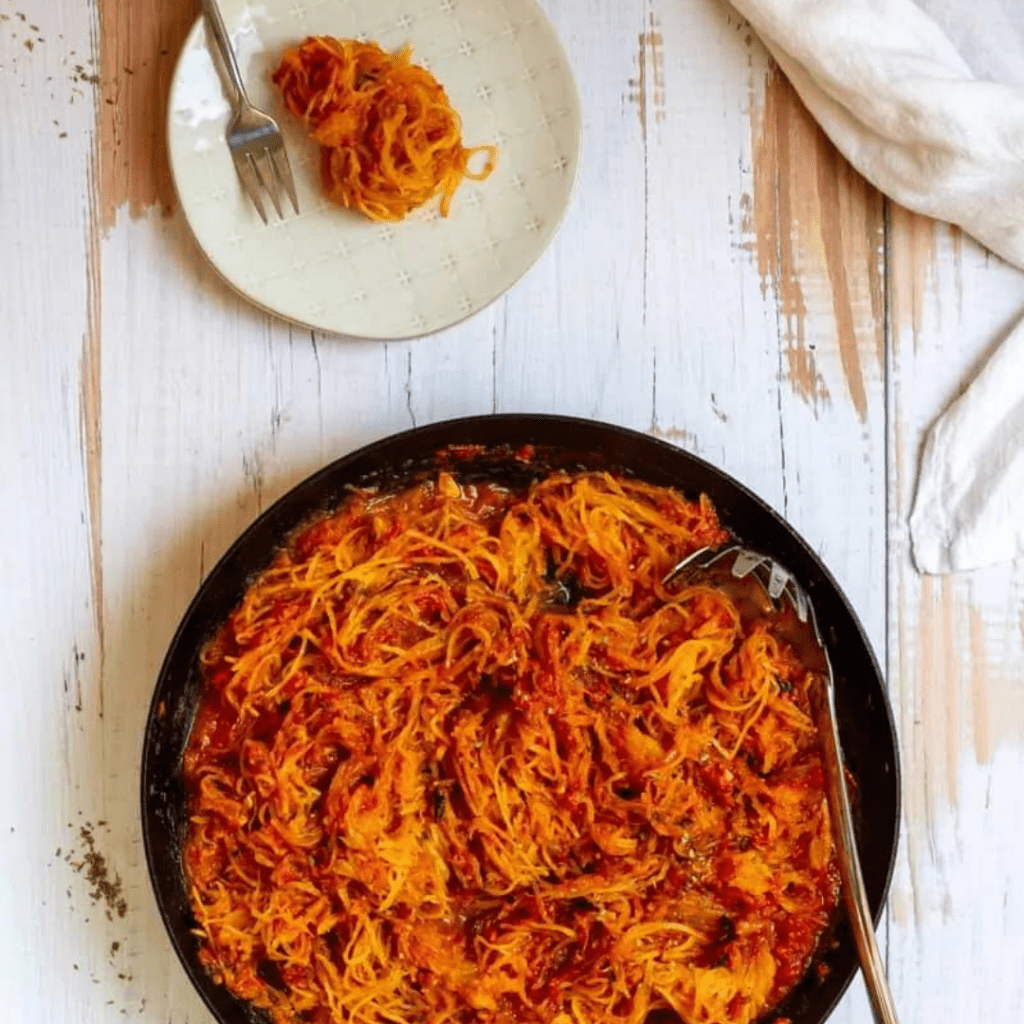 spaghetti squash marinara in a black bowl