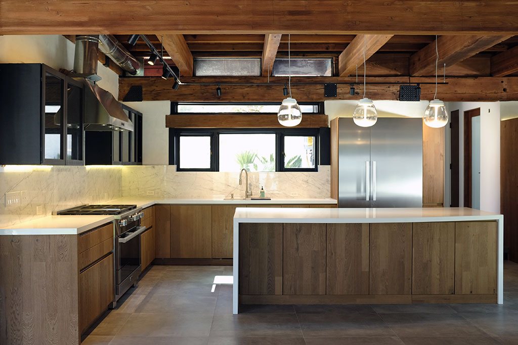 Unless you're lucky enough to have ample kitchen storage that extends up to the ceiling. Malibu Rustic Kitchen Featuring LEICHT Cabinets - LEICHT