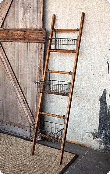 Constructed with durable steel, this shelf features a . Blanket Ladder with Wire Baskets - KnockOffDecor.com