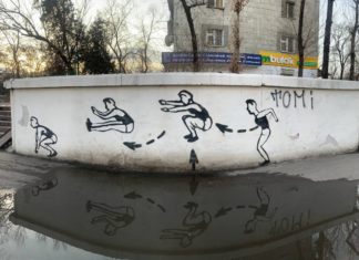 Бир кадр менен: Бишкектеги көлчүктүн фонундагы «Эрк жана ишеним секириги» стрит-арты