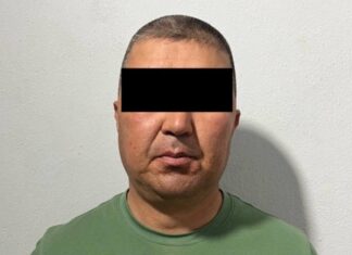 Сузак: Кызыл-Туу айыл өкмөтүнүн мурдагы башчысы Калмаматов мыйзамсыз жер сатууга шектелип кармалды