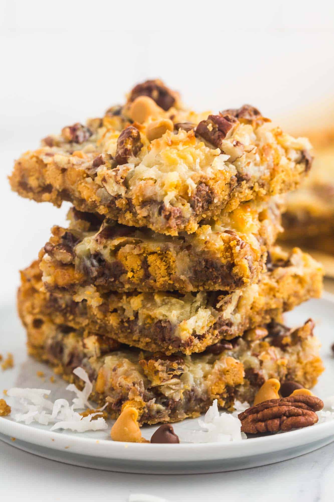 Combine graham cracker crumbs and butter in small bowl. Magic Bars Seven Layer Cookie Bars Little Sunny Kitchen