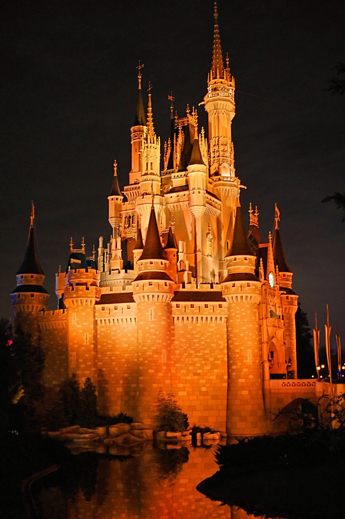 Wishes wedding collection ceremonies start at $10,000 for 20 guests or more. Disney - Orange Castle At Night | Cinderella castle at