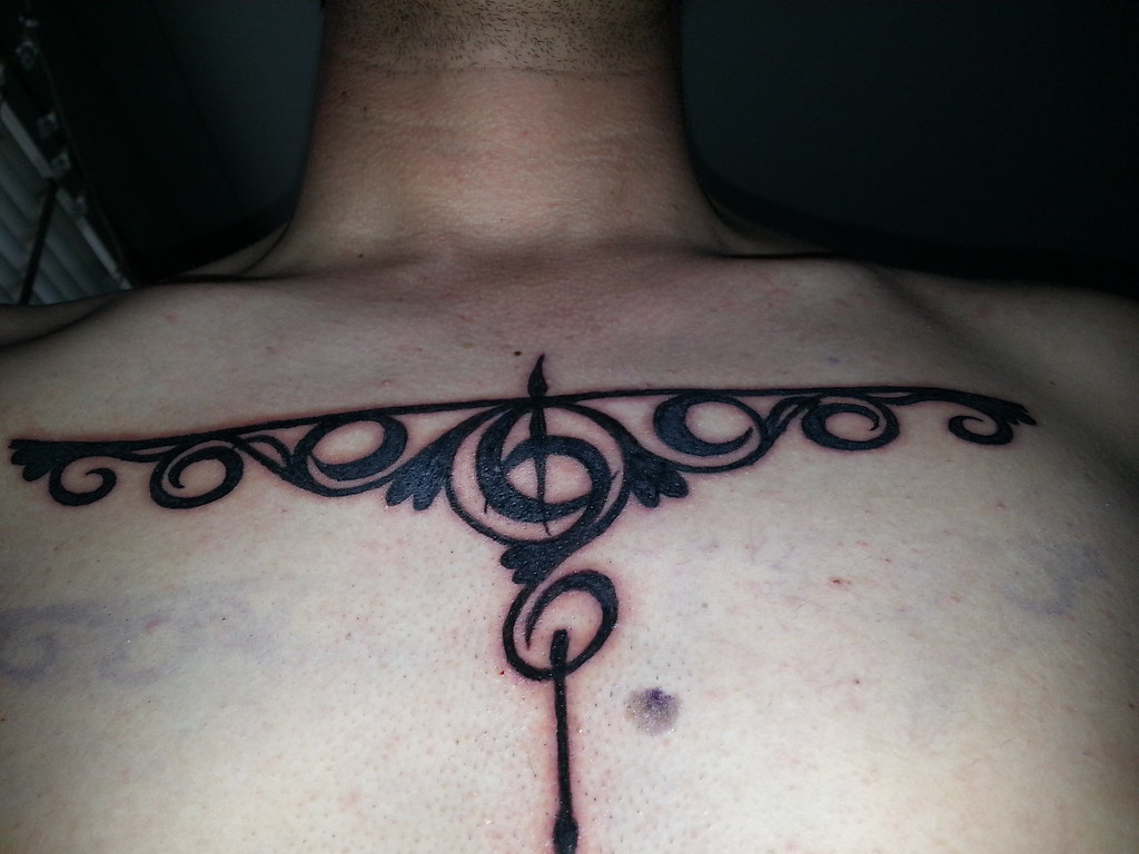 Scroll Chest Tattoo | These Scroll Designs Were Sign Written… | Flickr 768_x_1024_jpg