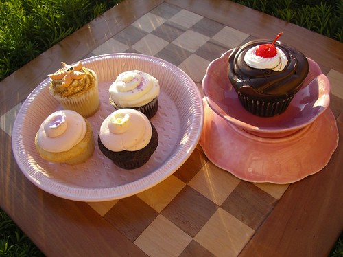 Bakeries can range from small neighborhood businesses that specialize in a few key items, to large industrial bakeries that supply food retailers with packaged baked goods. Multi Bakery Cupcake Sampler | Tacoma Cartoonist | Flickr
