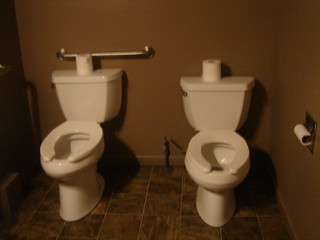 Riders sail through a jungle with dinosaur animatronics. Ladies Room At Jurassic Jungle Boat Ride Pigeon Forge Tn Flickr