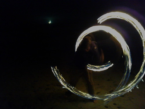 You can upgrade your fire gear with sparkling effect. Andrew spinning on SB Beach | Fire spinning poi with