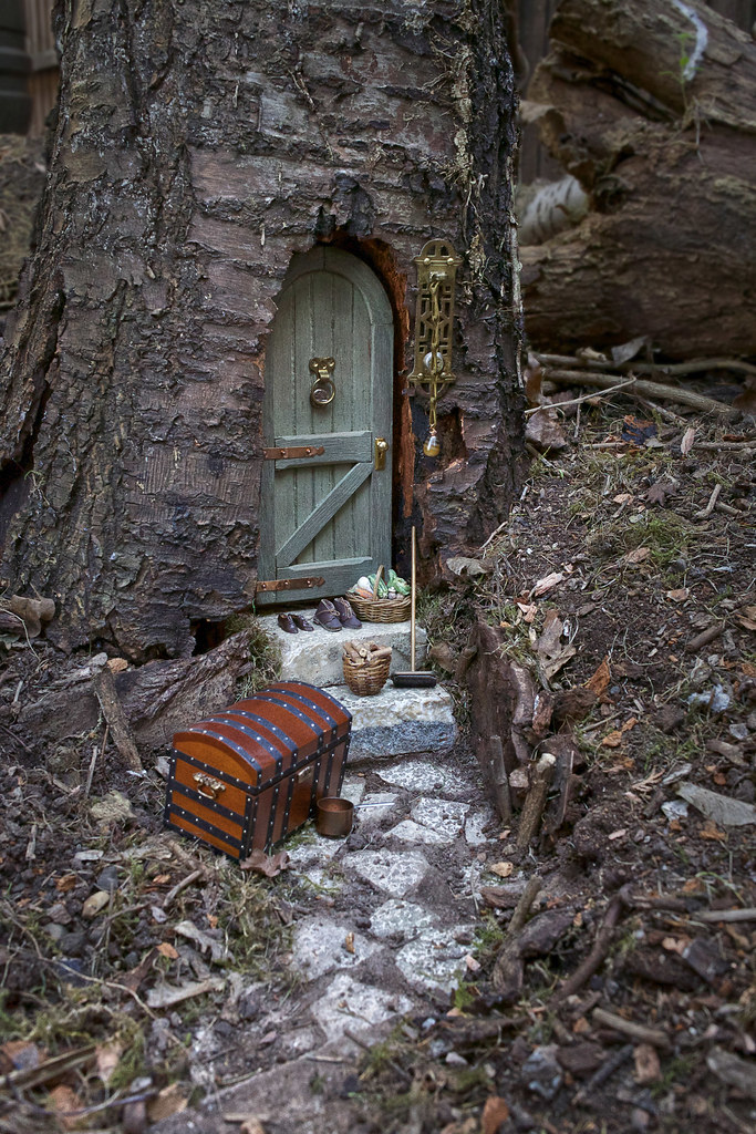 In truth, a garage does all of these jobs for most homeowners so this i. Fairy door in tree trunk | My latest garden project is