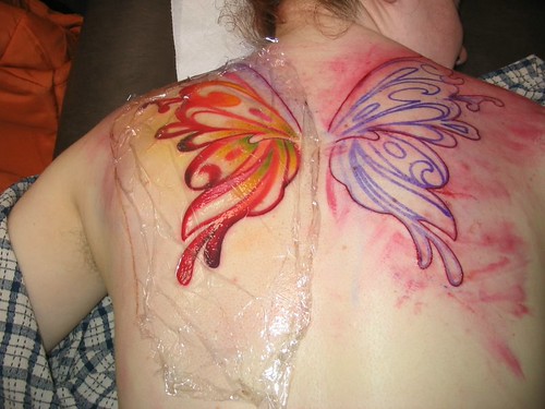 These medicated ointments do their jobs too well and your tattoo can . Annie's Tattoo In Progress - Saran Wrap | Halfway done, and â¦ | Flickr