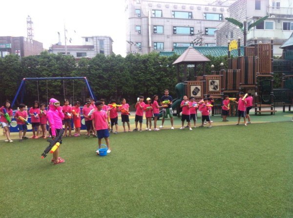 Watergun Fight with my class!  Not sure who's more excited...