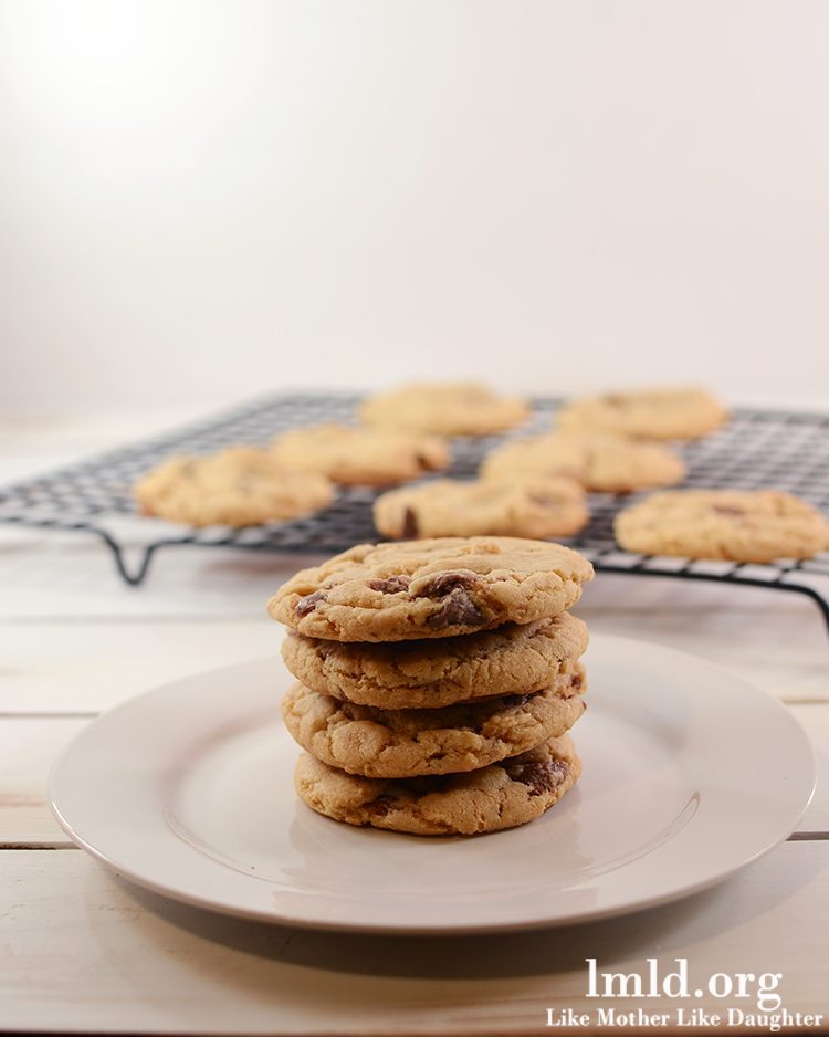Front view of malted chocolate chip cookies on a white plate.