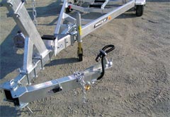 Tow to ramp, take trailer off, attach extension, put back on vehicle, launch,. Special Features Options Mackay Trailers
