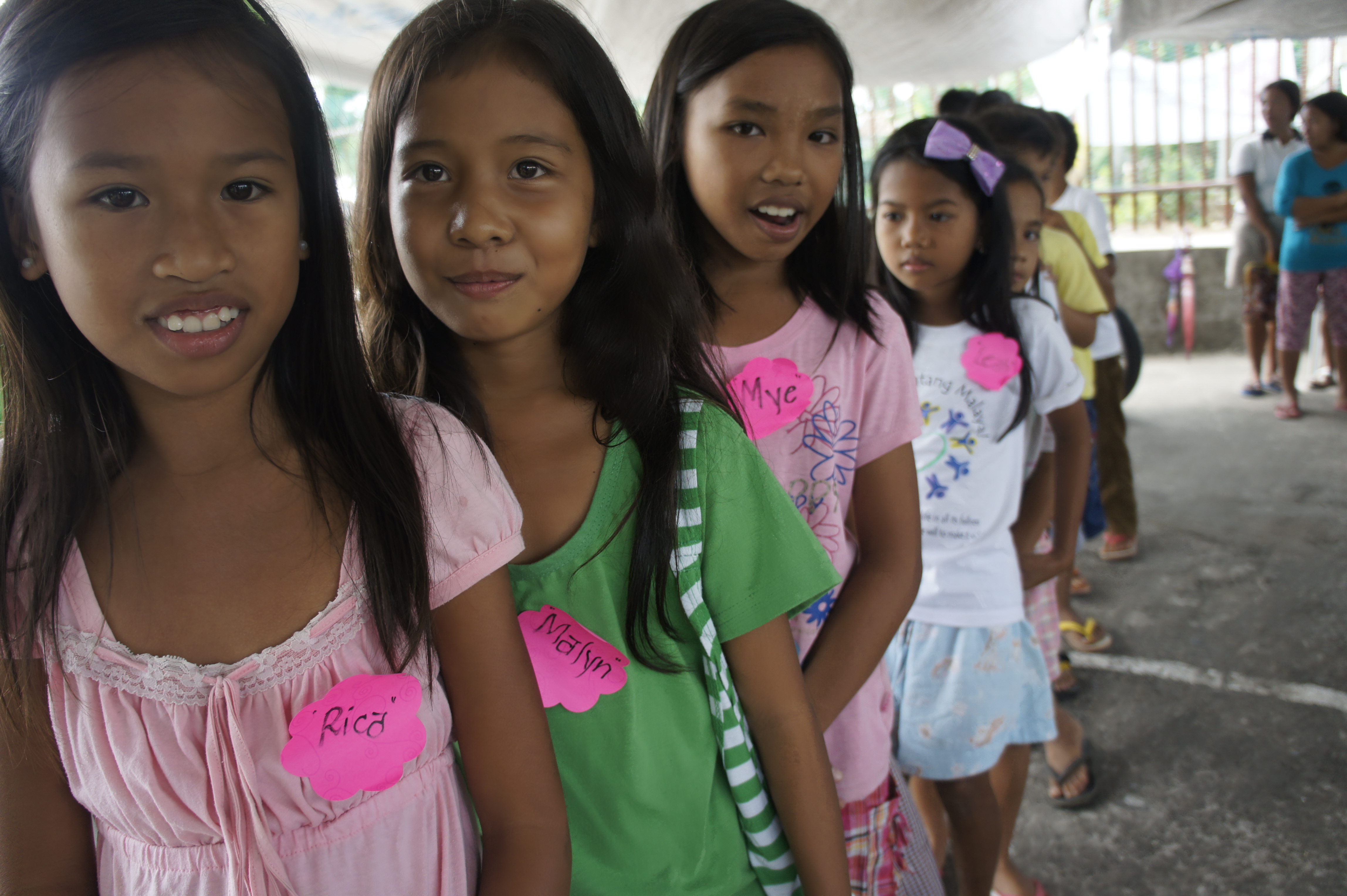 Girls ar a World Vision Christmas event in the Philippines