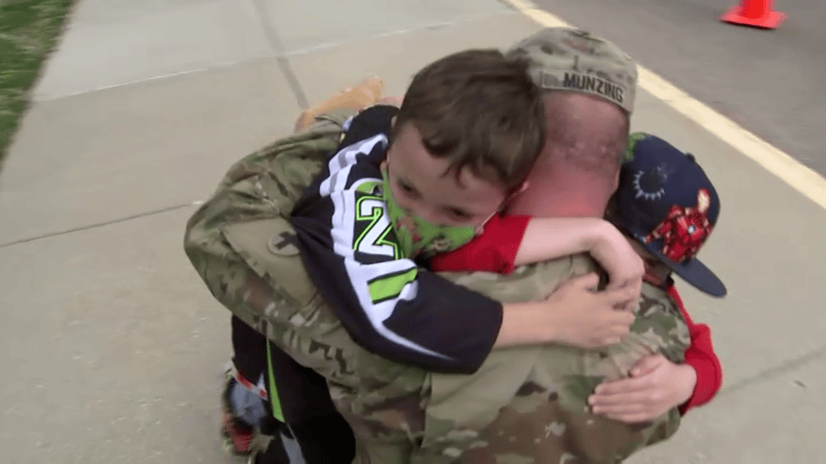 Heartwarming Military Family Reunion: Dad Surprises Sons at Deerfield School - Vimarsana News