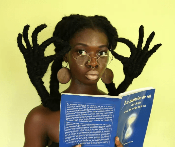 Artist Celebrates Natural Afro Hair By Sculpting Her Own Into