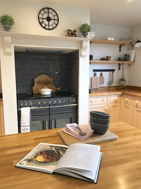 She saved on the cabinets and spent on the worktops