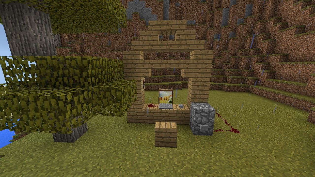 Ein schreibtisch mit laptop/computer, einem bücherregal und einer . á Computer auf einem Tisch in Minecraft bauen