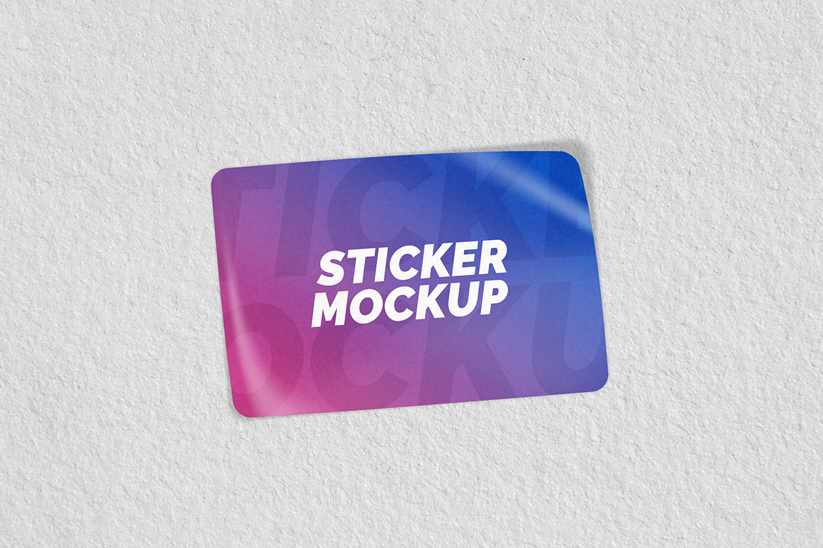 A mockup featuring a wide rectangle sticker with a curled peeling edge effect. Rectangular Sticker Mockup Mockupslib