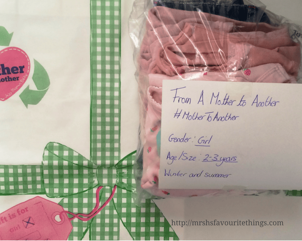 http://mrshsfavouritethings-com.stackstaging.com An outfit all packed up in a clear plastic bag with the size, sex and season of the outfit clearly labelled _ From a Mother to Another - a JoJo Maman Bébé Charity Campaign - Mrs H's favourite things