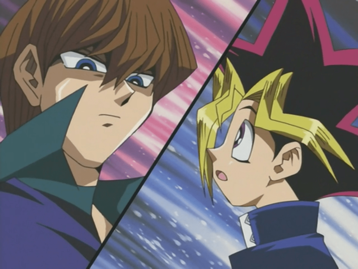 Featuring the protagonist yugi mutou in the foreground and the duelist . Yami Yugi And Seto Kaiba S Duelist Kingdom Duel Yugipedia Yu Gi Oh Wiki