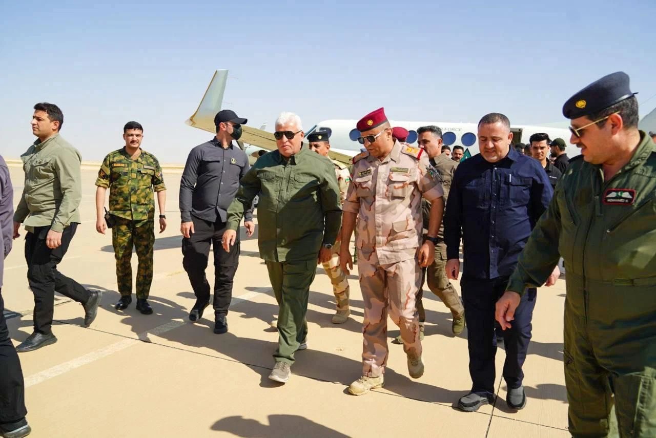 زيارة الفياض لقاعدة عين الأسد: هل تكشف عن تصاعد التهديدات ضد القوات الأجنبية؟