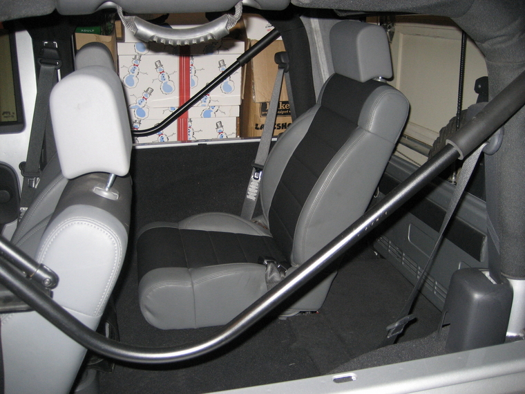 I hav a mint no broken clips subwoofer delete panel and seatbelt bezel. 2 door custom rear seat (bucket replacing bench) - JK