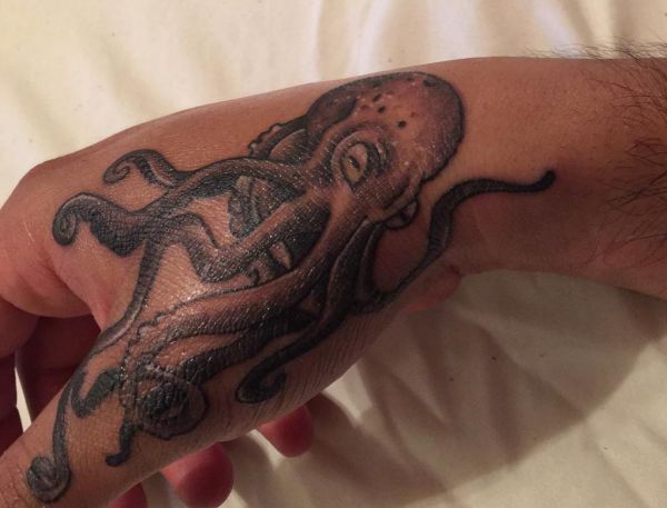 Octopuses And Squid Tattoos And Their Which Means - Nexttattoos 457_x_600_jpg