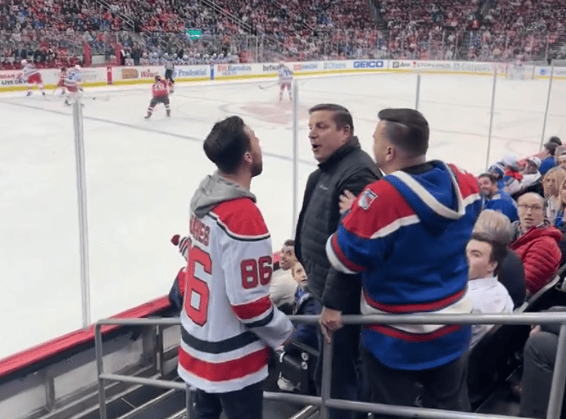 Head_butting_Devils_fan_ignites_wild_brawl_with_Rangers_fan