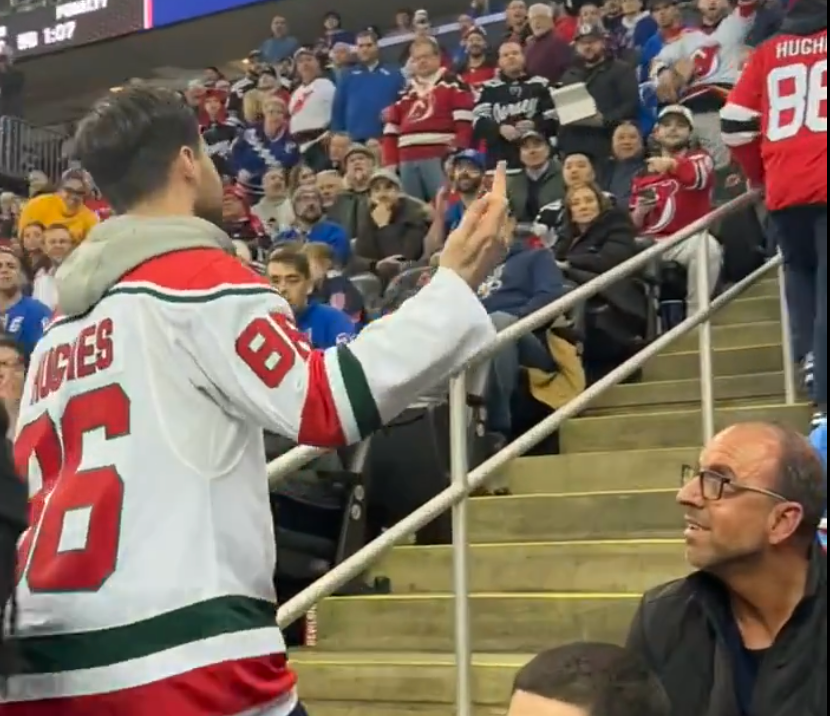 Head_butting_Devils_fan_ignites_wild_brawl_with_Rangers_fan