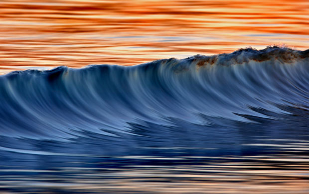The main application of professional sports photography is for editorial purposes. Photographs of Ocean Waves Captured With a Long Lens and Slow Shutter