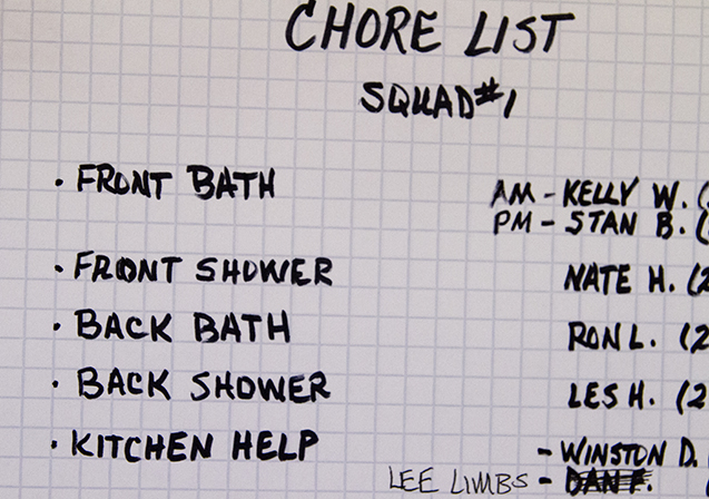 A chore list is posted on a MANA House wall to assign residents to cleaning duties. (Photo by Peter Haden/News21)