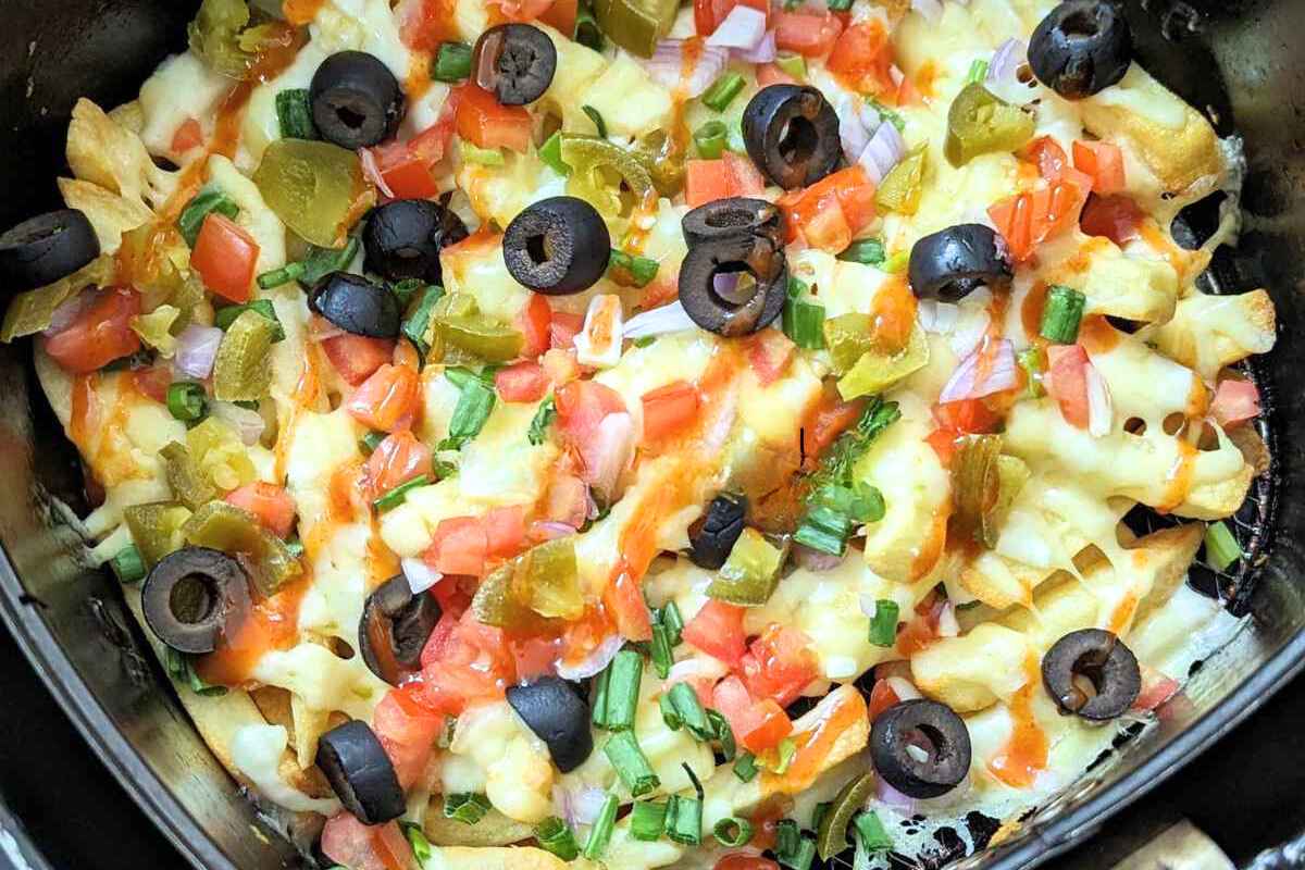 Loaded fries in air fryer basket