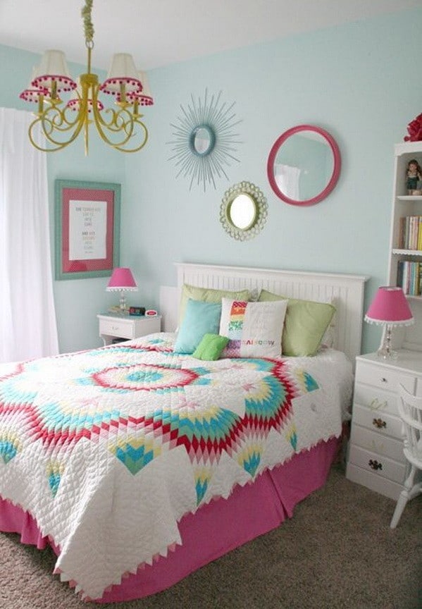 Green and pink girl's bedroom features walls painted pink lined with a pink and green print headboard on bed dressed in a pink embroidered duvet and green ikat pillows next to a gray nightstand, stanley furniture charleston regency palmetto telephone table, and an apple green double gourd lamp. Wall Paint Color Ideas - 53 Great Photos To Help You Get Ideas