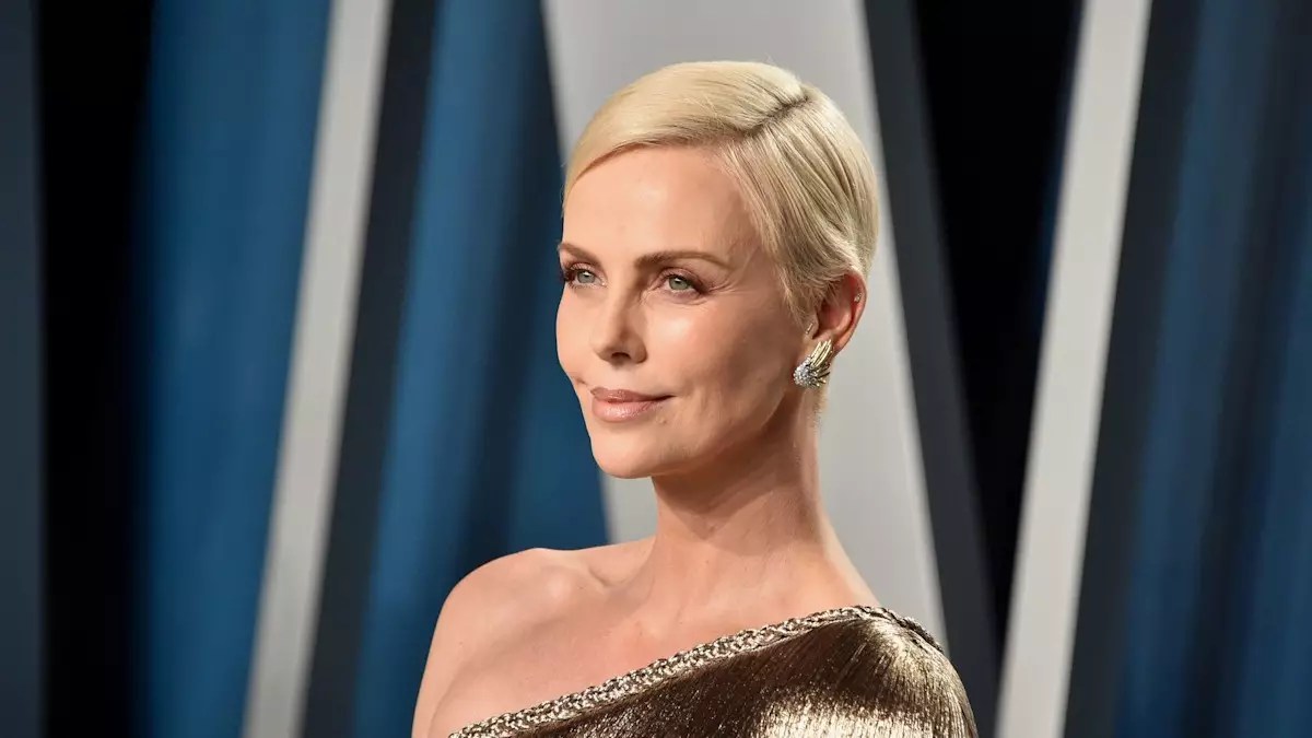 Celebrity Mom Charlize Theron Takes Daughters to Disney World for Spring Break