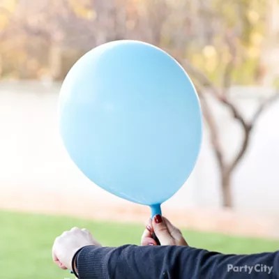 To hang, tie a ribbon around a balloon or two and pull the ends until a knot forms at the middle of the cluster. Rainbow Balloon Arch How-To - Party City