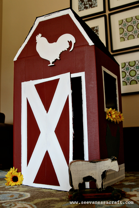 This children's paper playhouse is shaped like a barn or farm house and has intricate designs including a chimney, cat, dog and rooster . (diy tutorial) cardboard box barn - See Vanessa Craft
