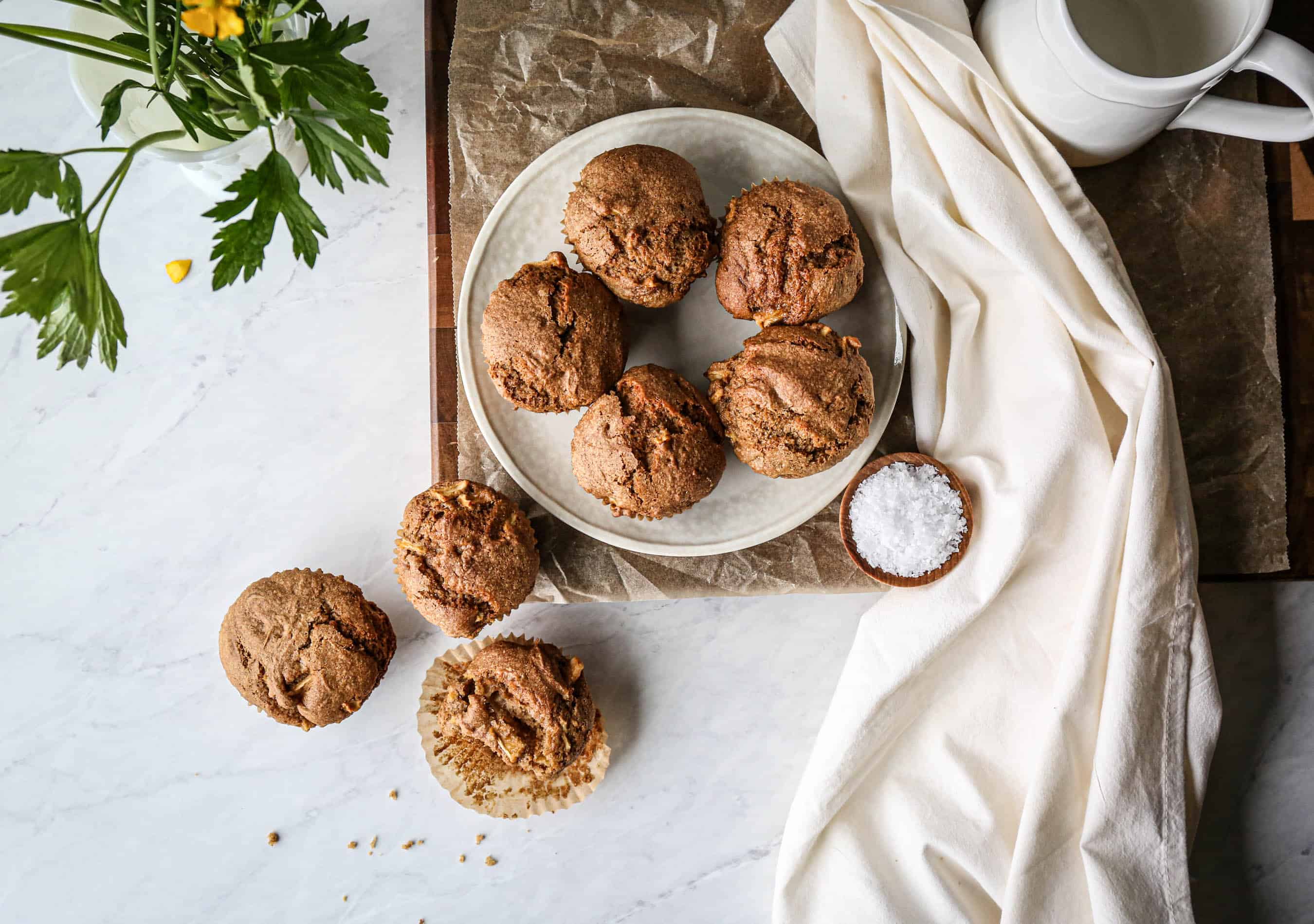 a plate of gluten free apple spice muffins