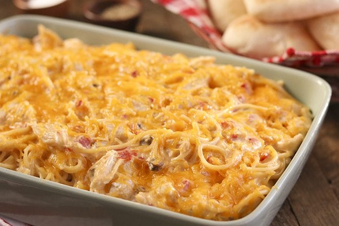 Chopped chicken is simmered with tomatoes and green chiles, cream of chicken soup, processed cheese and mushrooms. Ultimate Chicken Spaghetti Southern Bite