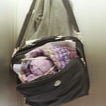 bag of tricks, bathroom stall, chicago airport
