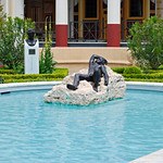 Statue of reclining male in reflecting pool