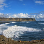 a coast where trolls were frolicking in the sea