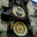 Astronomical clock on the city hall tower in the old town square in Prague