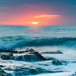 Sunrise Seascape and Rocky Headland