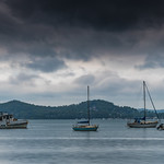 Overcast and Cloudy Bay with Boats