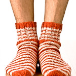 Man legs in strip socks