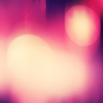 Abstract background with bokeh defocused lights and shadow.Multicolors bokeh.Vintage style.Disco lights.